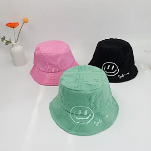 Kids smiling bucket hat set in pink, mint, and black cotton with embroidery
