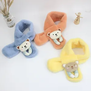 Detailed plush texture of kids scarves in blue, orange, and yellow with cute bear toys