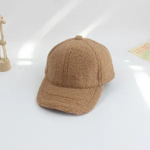 Detailed texture of warm dark khaki lamb wool baseball cap for kids winter wear