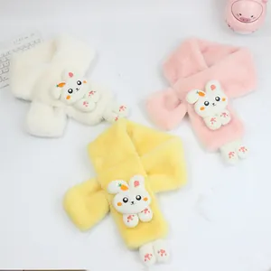 Detail of plush cartoon bunny scarves in white, pink, and yellow with a cross-insert design
