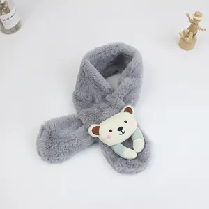 Close-up of soft grey plush kids scarf featuring a cute 3D cartoon bear decoration