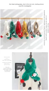 Detail of soft faux rabbit fur scarves for kids with festive 3D Christmas characters