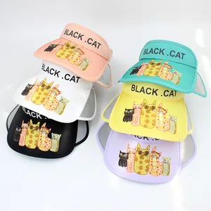 Detail showing various colors of children's sun visors with cute cartoon cat prints
