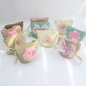 Handmade straw cross-body bags for girls with lace bows and cute pearl decorations