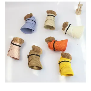 Foldable straw sun visors for kids with cute bear decor in seven diverse colors