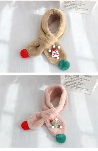 Detail of plush faux rabbit fur kids scarves with cartoon snowman and Christmas tree motifs