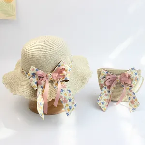 Strohhut und passende Handtasche Set mit Blumenschleife für Mädchen im Sommerurlaub