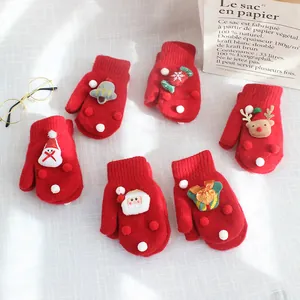 Red Christmas knitted mittens for kids featuring 3D Santa, reindeer and festive ornaments
