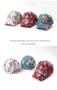 Detail view of floral baseball caps showing adjustable buckle and vintage flower patterns