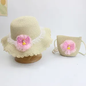 Girl's straw sun hat and matching bag set with pink mesh flower and sequin doll decor