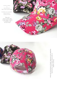 Detail of floral washed denim baseball cap featuring adjustable velcro strap and premium fabric