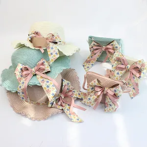 Strohhut-Set für Mädchen mit passender Umhängetasche und floraler Schleife in Pastell