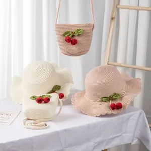 Girl's straw hat and matching cherry crossbody bag set for summer sun protection
