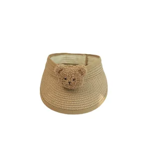 Kids woven straw sun visor hat with cute plush bear decoration in khaki beige color