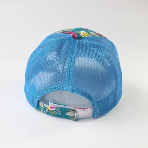 Floral baseball cap with blue mesh back and adjustable strap shown from rear view