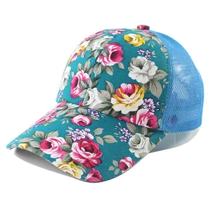 Women floral mesh trucker hat with blue canvas rose print and breathable back