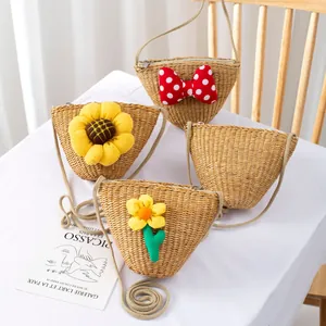 Handmade woven straw crossbody bag for kids with floral decor and zipper closure