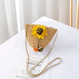 Handmade straw crossbody bag with large sunflower ornament and zipper for kids