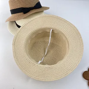 Straw sun hat for women and children with black ribbon bow and elastic windproof rope