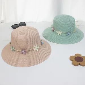Damen Strohhut für Strand mit Wellenrand und dekorativen Netzblumen in Rosa und Grün