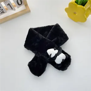 Detail of plush black toddler scarf with a cute 3D panda doll and soft faux fur texture