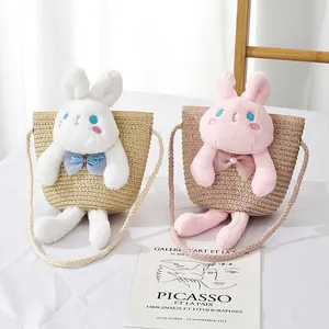 Cute girls straw crossbody bags with 3D plush bunny dolls in white and pink colors