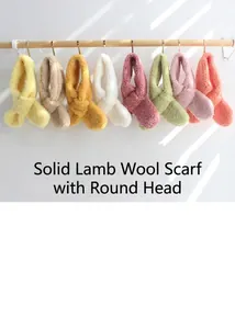 Detail view of thickened lamb wool scarves in eight colors hanging on a wooden rack