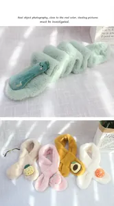 Detailed view of colorful plush kids scarves with cute fruit patches and soft textures