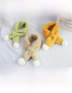 Detail showing thick lamb fleece neck warmers in avocado green, khaki, and yellow tones