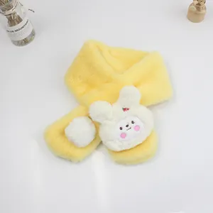 Detail of yellow plush kids scarf with a 3D white rabbit patch and soft faux fur texture