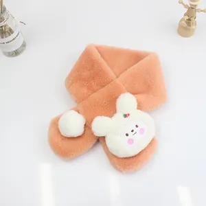 Detail view of pink plush scarf with cute cartoon bunny patch and small white pompom