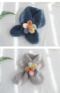 Detailed texture of plush lamb velvet scarf with colorful floral accents for children
