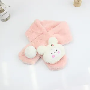 Close-up of pink plush scarf for girls with a cute bear head and soft pom pom detail