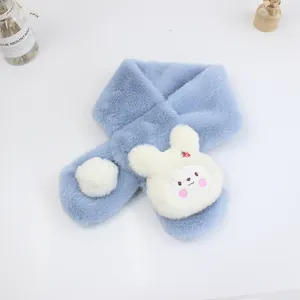 Detail of light blue faux rabbit fur scarf with cute strawberry bunny and white pompom