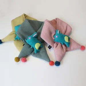 Knitted children scarves with 3D crocodile toys and colorful pompoms in various colors