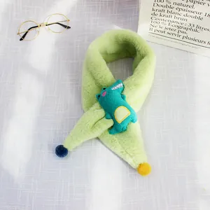 Close-up of light green plush scarf for kids featuring a cute 3D dinosaur cartoon doll