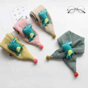 Cozy knit children's scarves with cute 3D plush crocodiles and colorful pom-poms