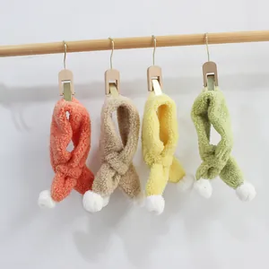 Winter plush lamb velvet scarf for kids with soft pom-poms and cross-loop fastening