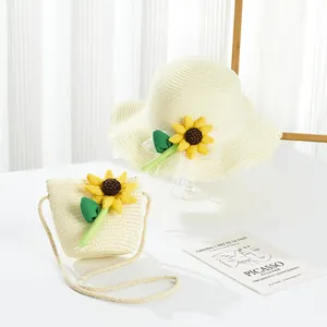 Detailansicht Strohhut und Tasche mit handgefertigten 3D-Sonnenblumenverzierungen