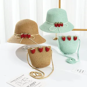 Straw sun hat and matching crossbody bag set with cute strawberry decor for girls