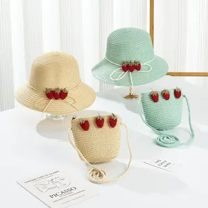 Kids summer straw hat and strawberry shoulder bag set in beige and mint green colors