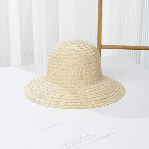 Cappello da sole da donna in paglia intrecciata con nastro nero e fiocco elegante