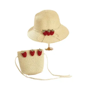 Kids summer straw sun hat and matching crossbody bag set with cute strawberry appliques