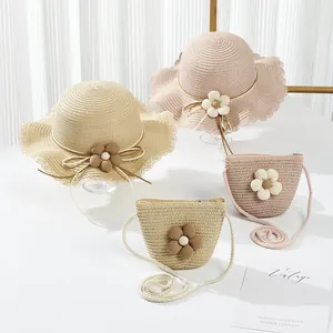 Cappello di paglia e borsa per bambine con fiori 3D per i viaggi estivi all'aperto