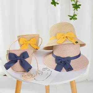 Detailed straw sun hat and matching bow crossbody bag set for girls in summer