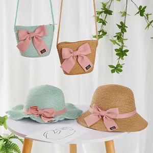 Kids summer straw hat and matching crossbody bag set with pink bows for girls