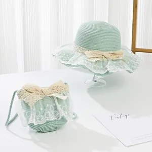 Kids mint green straw hat and purse set with white lace bows for summer beach wear