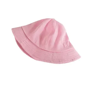 Kids pink corduroy bucket hat with wide brim for sun protection and outdoor summer wear