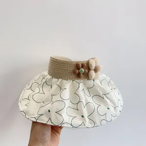 Foldable floral sun visor hat with woven details and floral accents for children and women