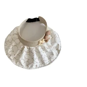 Kids floral open top sun hat with wide brim and decorative side flowers for summer